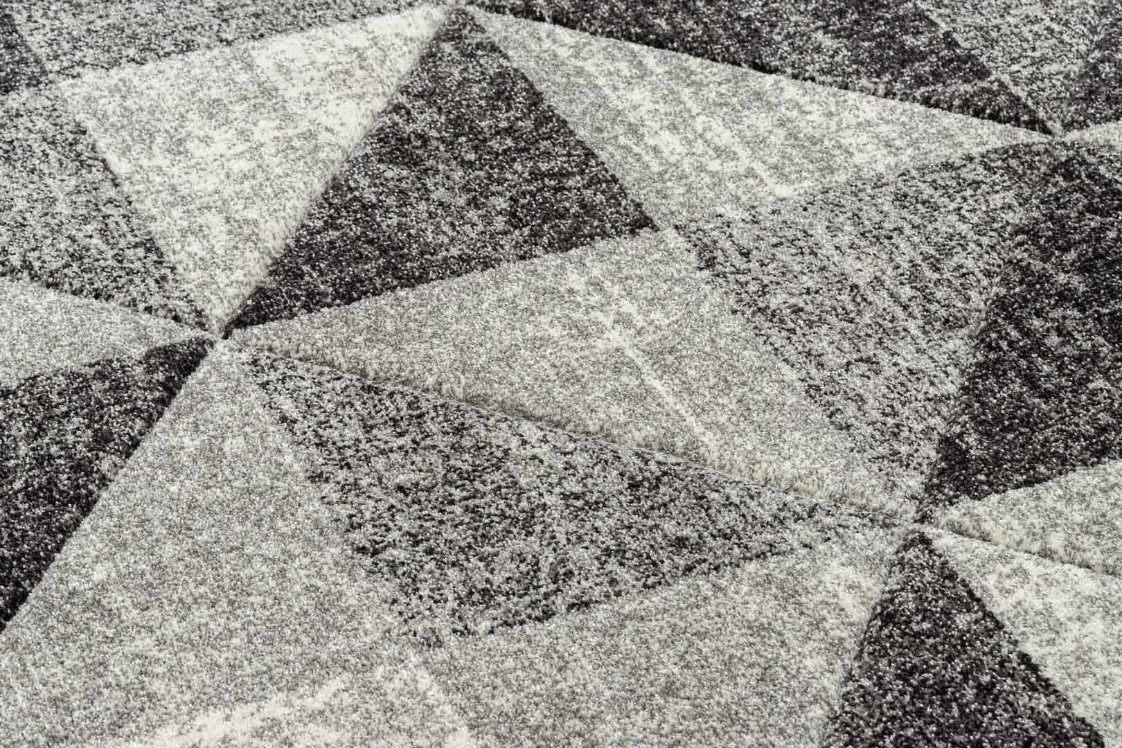 Syntetický tmavý koberec s geometrickým vzorom s efektom plastického tieňovania a kamufláže, trojuholníky a štvorce - Dywany Łuszczów obrázok 3