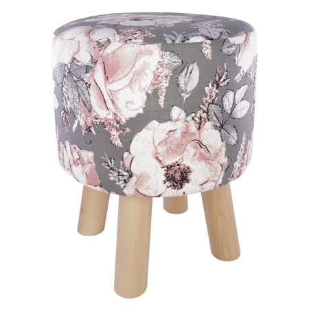 Módny, nadčasový puf, stolček na sedenie s kvetmi divokej ruže na sivom pozadí